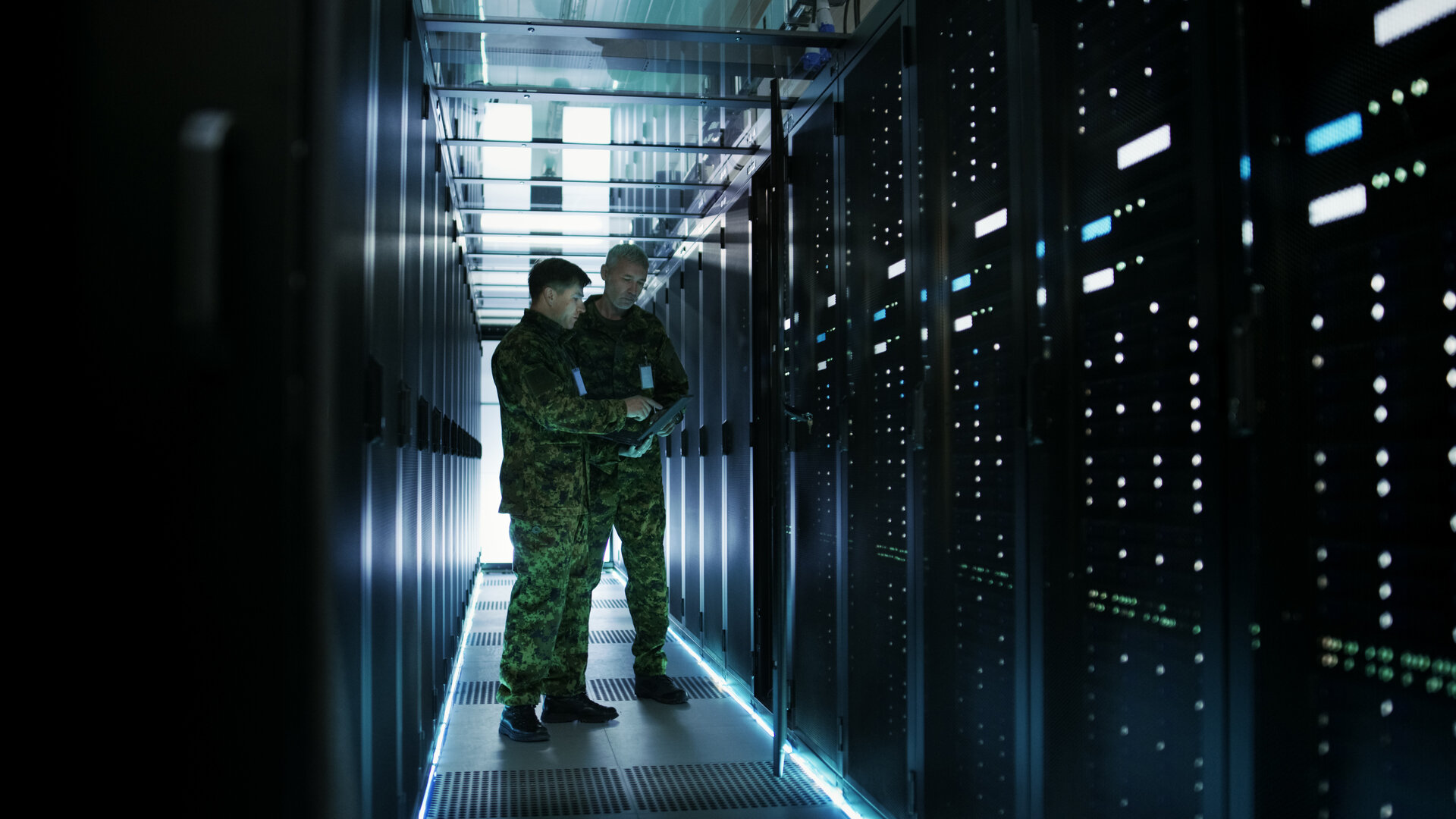 Military dudes in a server room