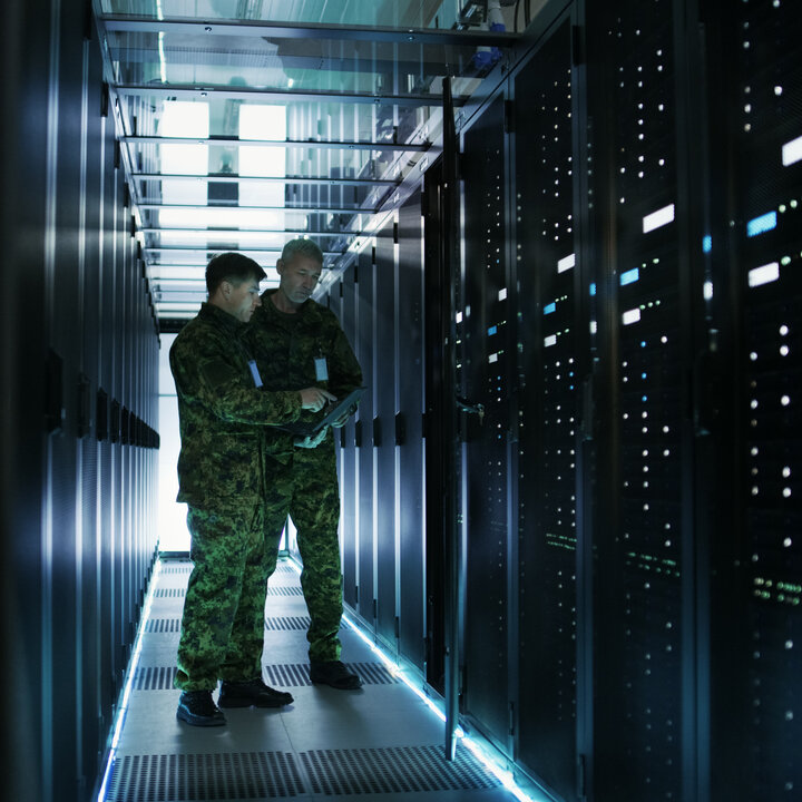 Military dudes in a server room