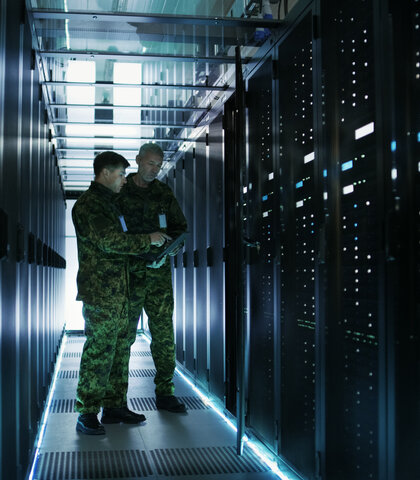 Military dudes in a server room